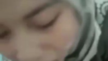 Jilbab Sepong kontol Paksu Crot Dimuka